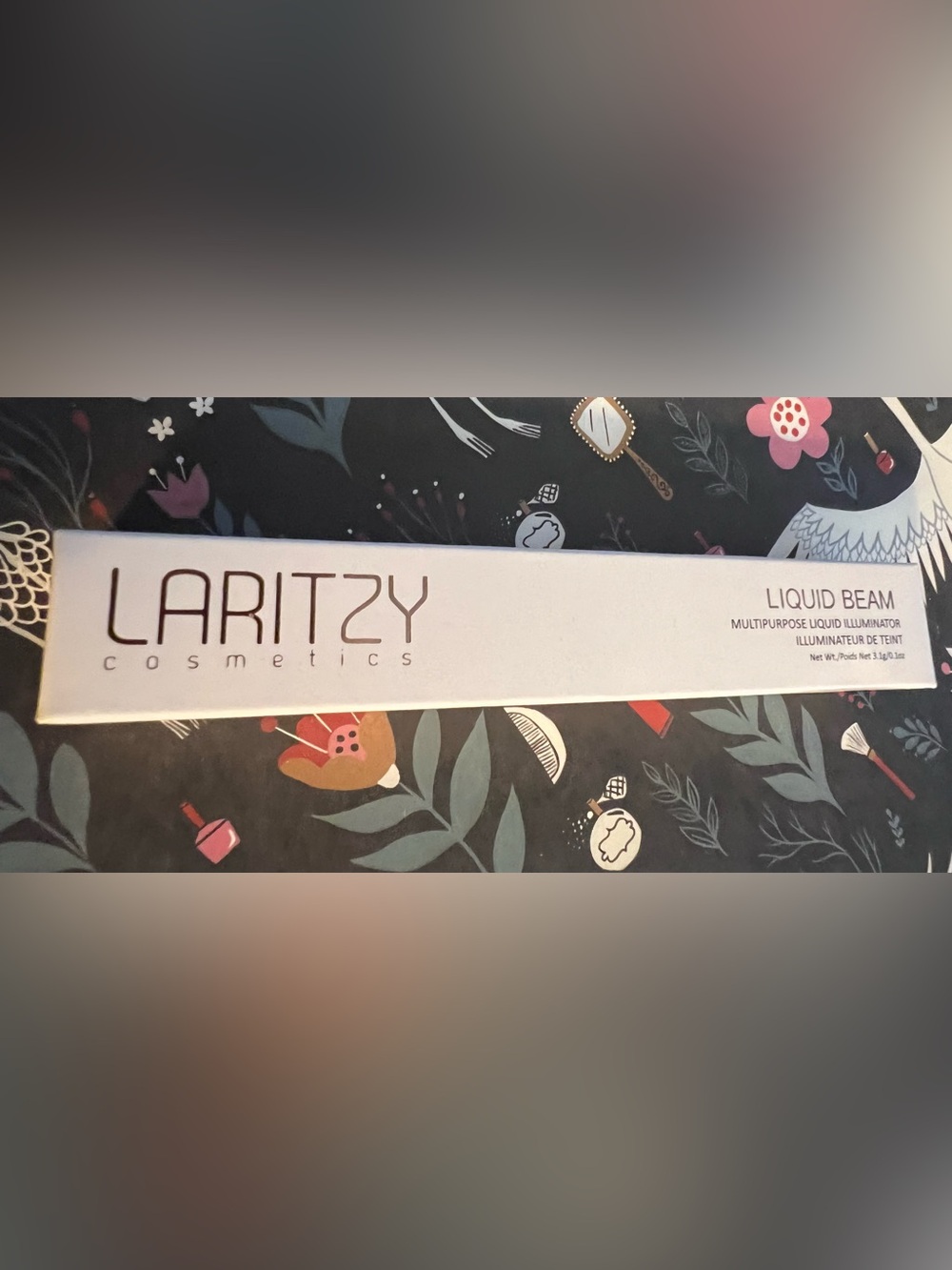 Laritzy Liquid Beam Multipurpose Illuminator - shade Topaz